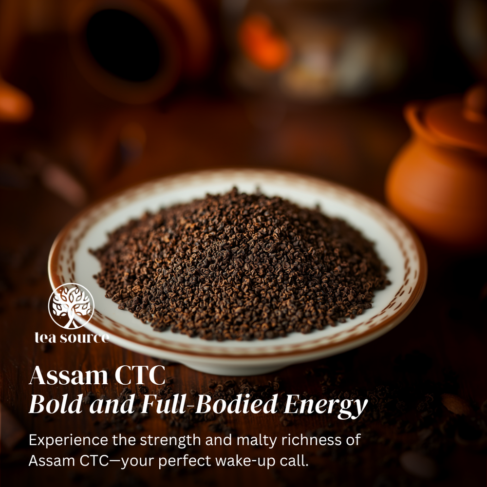 
                      
                        A plate of Assam CTC tea granules on a rustic table, with terracotta teaware in the background. Text overlay reads: ‘Assam CTC – Bold and Full-Bodied Energy. Experience the strength and malty richness of Assam CTC—your perfect wake-up call.
                      
                    