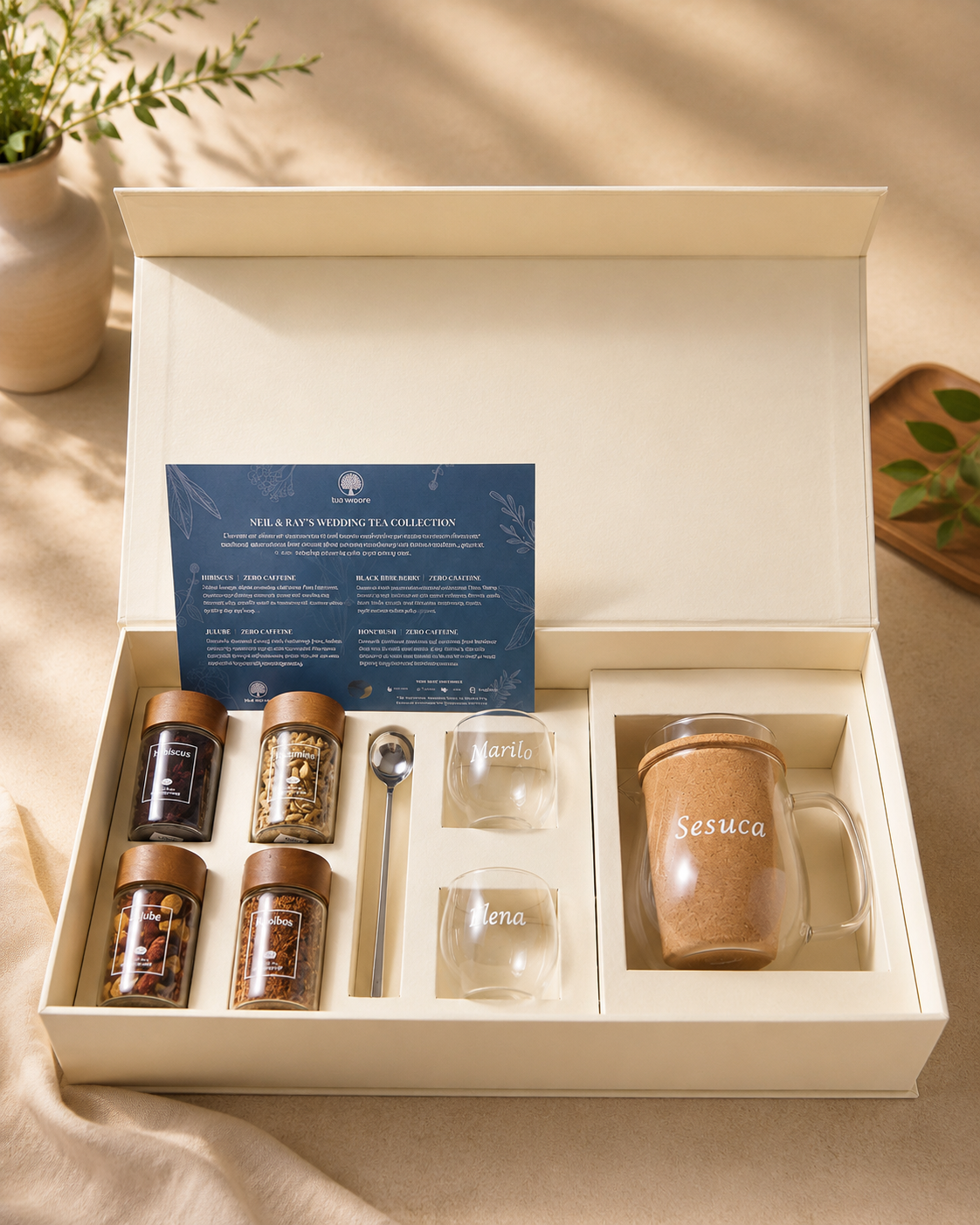 Loose leaf tea gift set jars with a gold mesh tea infuser
